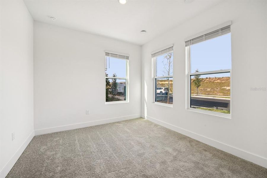 Spacious, unfurnished interior of a new home in Parkview at Hamlin, Winter Garden (Image 33).