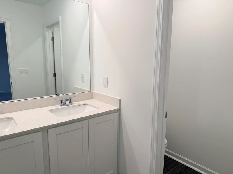 Primary Bath - Clean geometry and high-contrast finishes. Primary Bath - Clean geometry and high-contrast finishes.