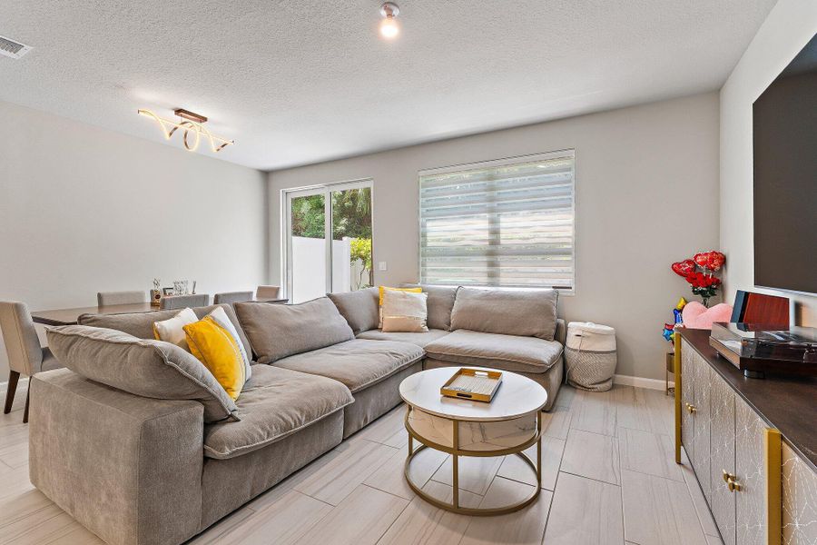 Furnished interior view inside a new home in Enclave at Mangonia Park, West Palm Beach (Image 31).