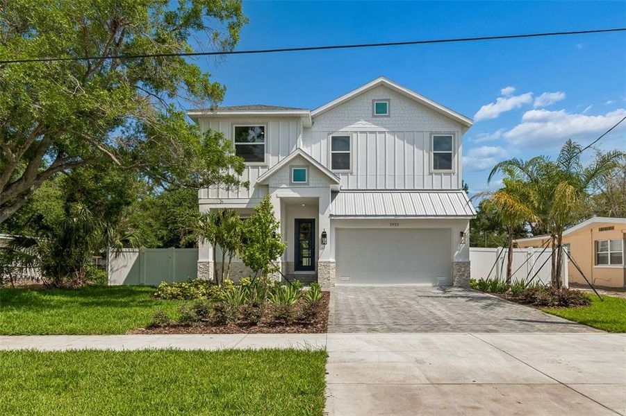 Front exterior of a new home in , Tampa, FL, highlighting curb appeal (Image 28).