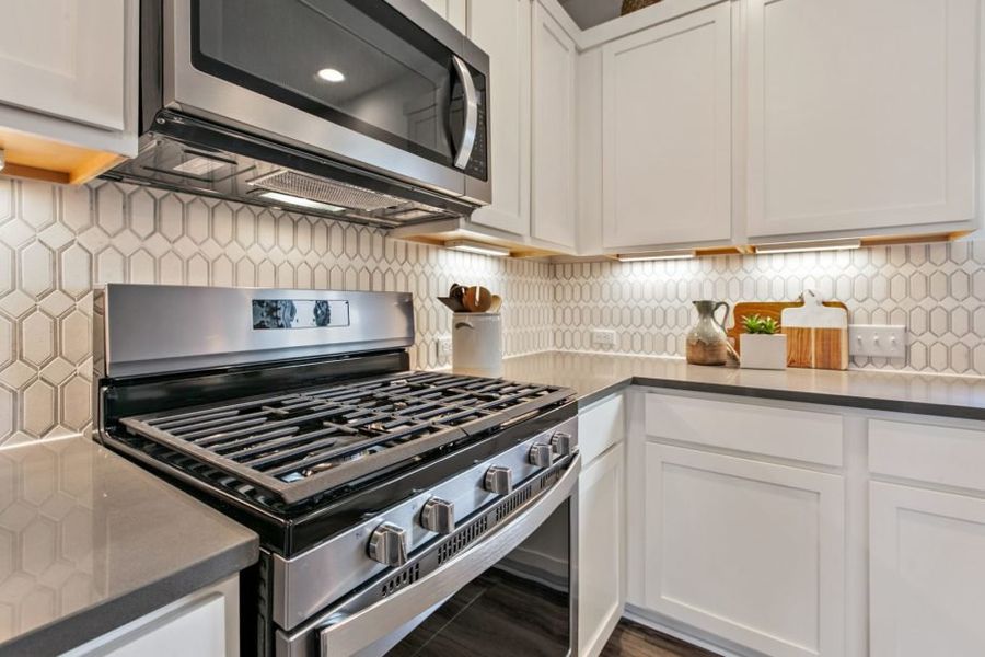 Furnished interior view inside a new home in Village At Manor Commons, Manor (Image 5).