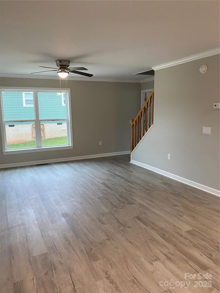 VIEW TO FRONT WINDOW & STAIRS