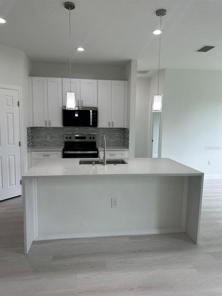 Furnished interior view inside a new home in , Palm Bay (Image 5). Furnished interior view inside a new home in , Palm Bay (Image 5).