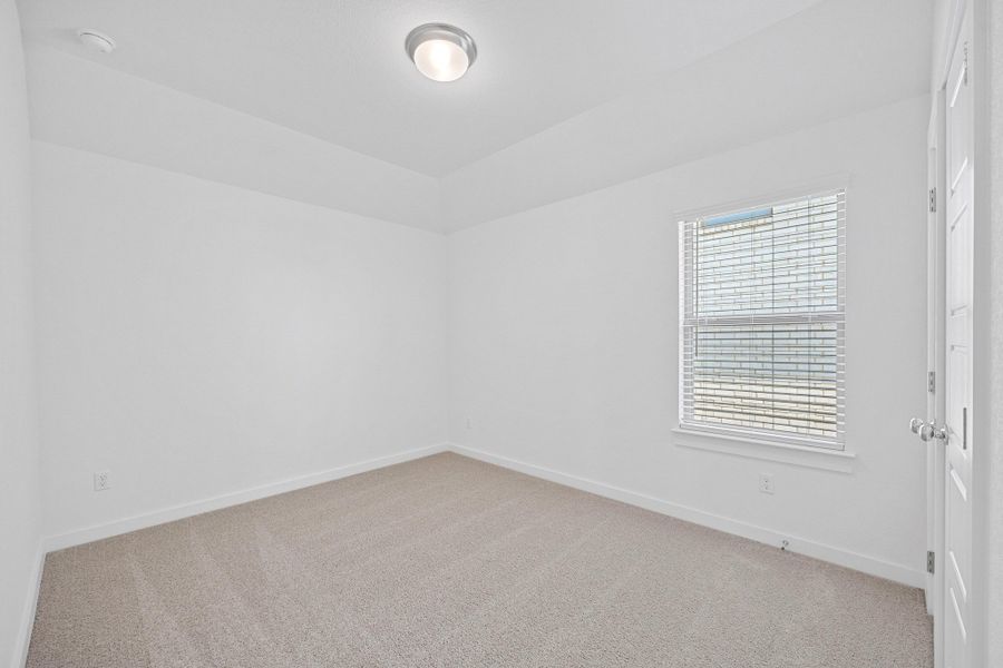 Bedroom in the Oak home plan by Trophy Signature Homes – REPRESENTATIVE PHOTO Bedroom in the Oak home plan by Trophy Signature Homes – REPRESENTATIVE PHOTO