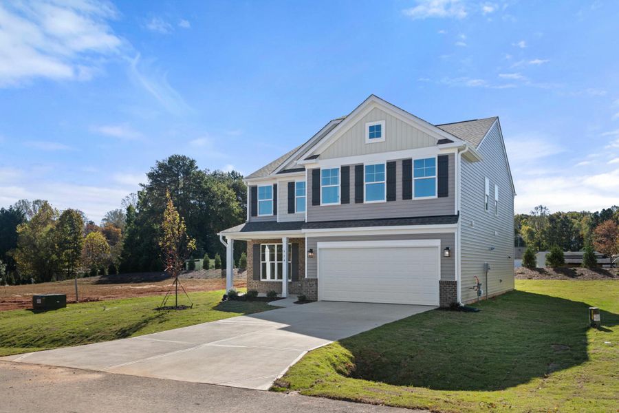 Front exterior of a new home in Pisgah Park, Kernersville, NC, highlighting curb appeal (Image 22).
