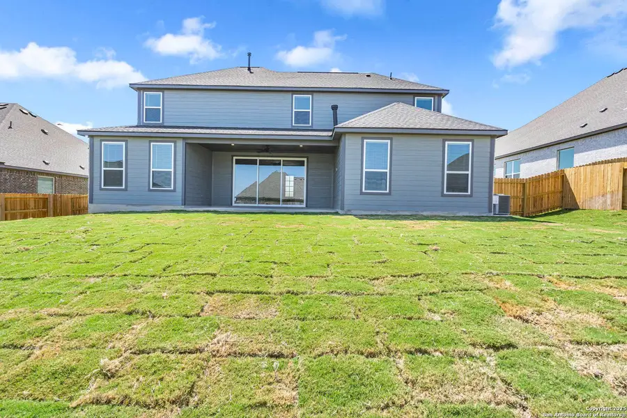Exterior details and patio area of a home in Potranco West, Castroville (Image 2).