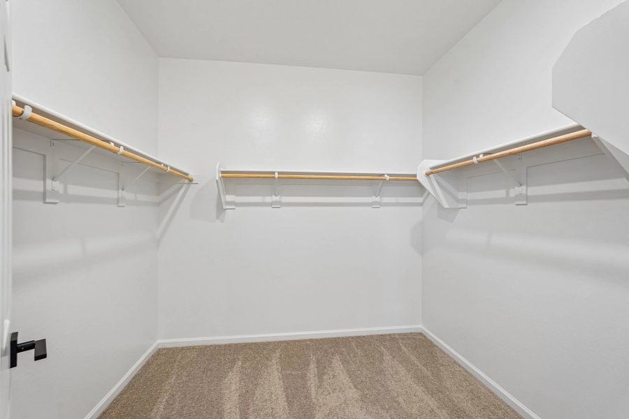 Primary walk in closet Primary walk in closet