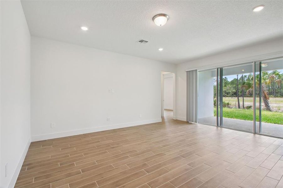 Spacious, unfurnished interior of a new home in Ridgehaven - Reserve Series, Ormond Beach (Image 34).