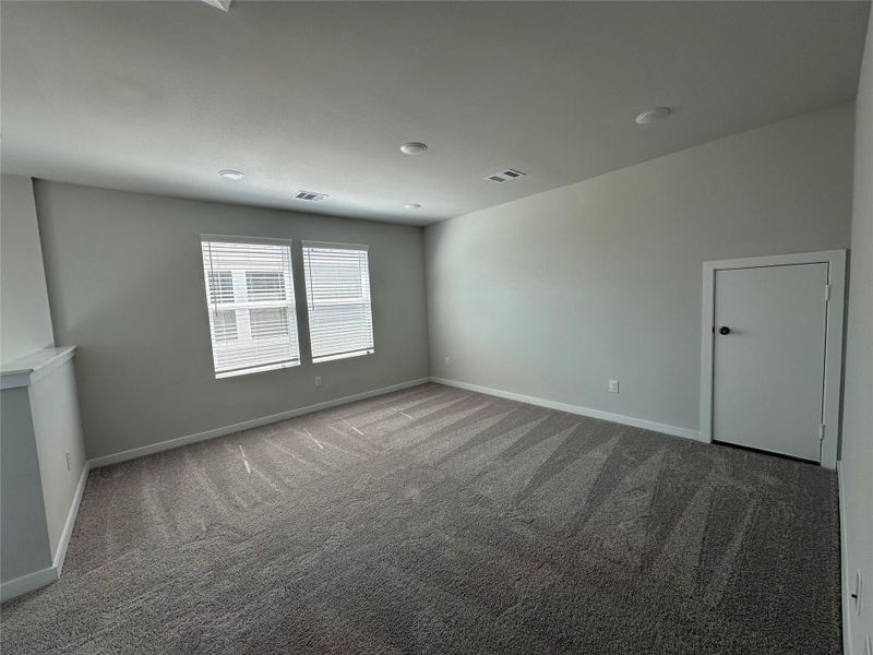 Spacious, unfurnished interior of a new home in Lonestar Collection at Aurora, Katy (Image 15).