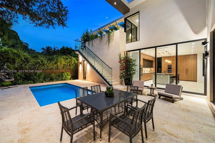 Exterior details and patio area of a home in , Miami (Image 3).
