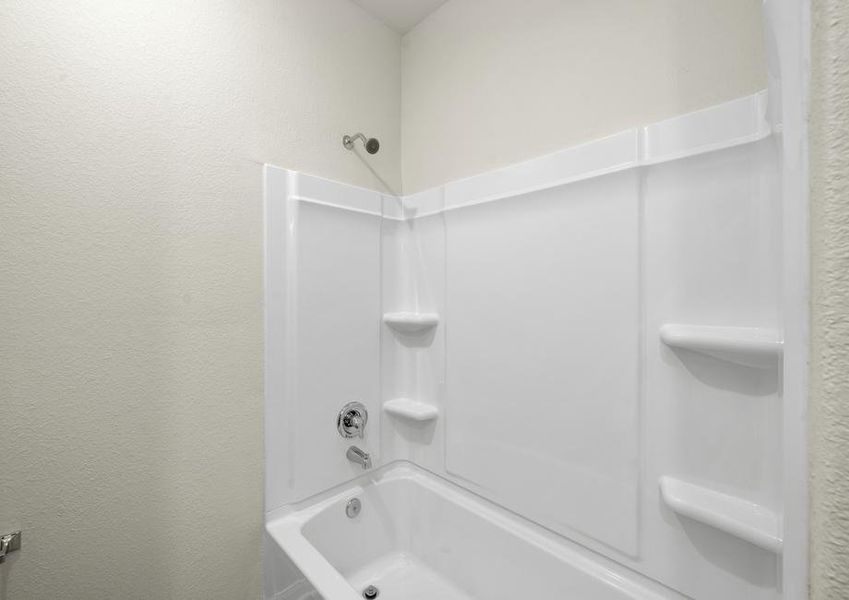 The secondary bathroom with a bathtub