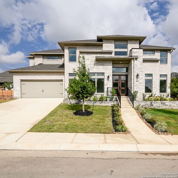 Exterior details and patio area of a home in Kinder Ranch 70', San Antonio (Image 17). Exterior details and patio area of a home in Kinder Ranch 70', San Antonio (Image 17).