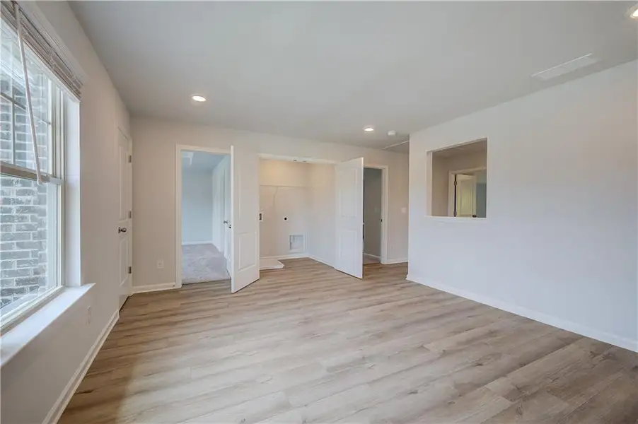 Spacious, unfurnished interior of a new home in Adagio, Dacula (Image 31).