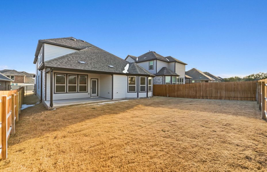 Exterior details and patio area of a home in Saddleback at Santa Rita Ranch, Liberty Hill (Image 27). Exterior details and patio area of a home in Saddleback at Santa Rita Ranch, Liberty Hill (Image 27).
