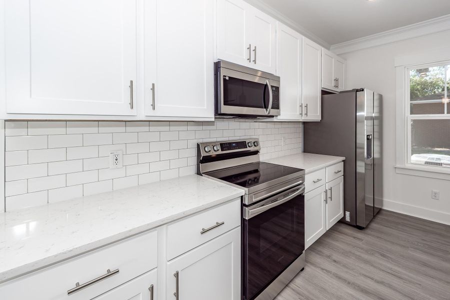 Furnished interior view inside a new home in , North Charleston (Image 8).