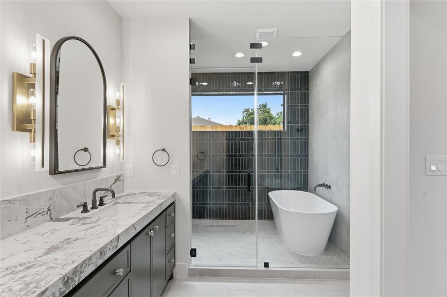 Thoughtfully designed for comfort and elegance, this luxurious primary bath creates the perfect everyday escape.