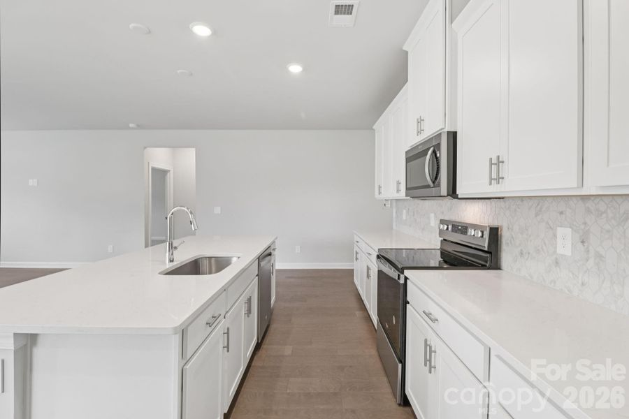 Photo is not of the actual home, but is an inspirational photo of builder’s model home and may depict options, furnishings, and/or decorator features that are not included