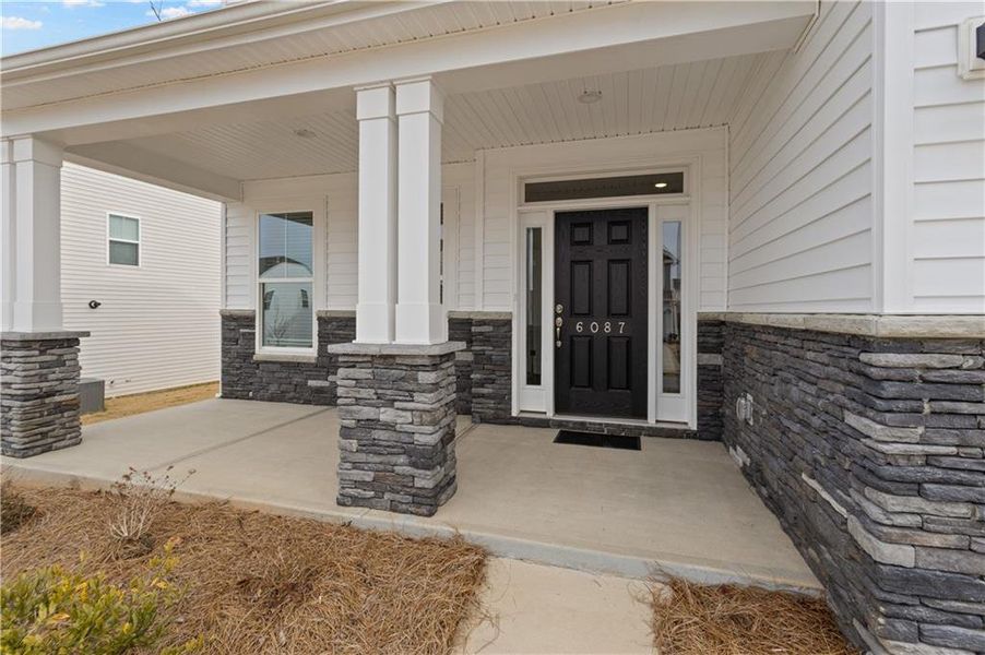 Exterior details and patio area of a home in Twin Lakes, Hoschton (Image 3).