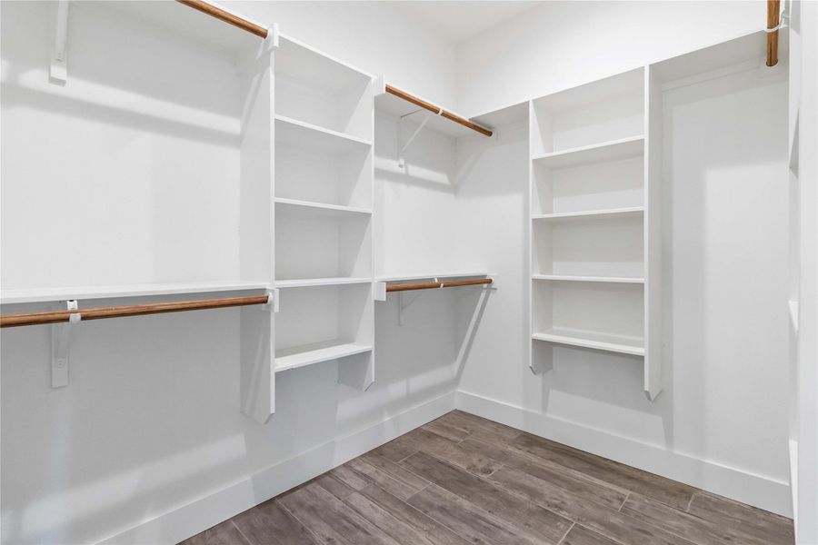 Primary walk-in closet Primary walk-in closet