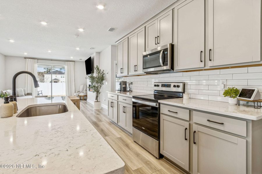 Furnished interior view inside a new home in , Fernandina Beach (Image 32).