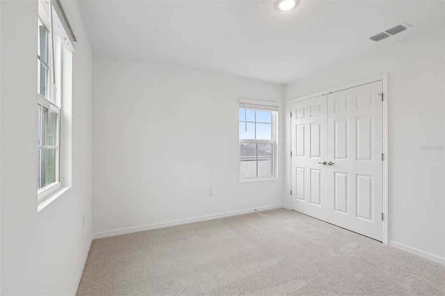 Spacious, unfurnished interior of a new home in Eagletail Landings, Howey-in-the-Hills (Image 31).
