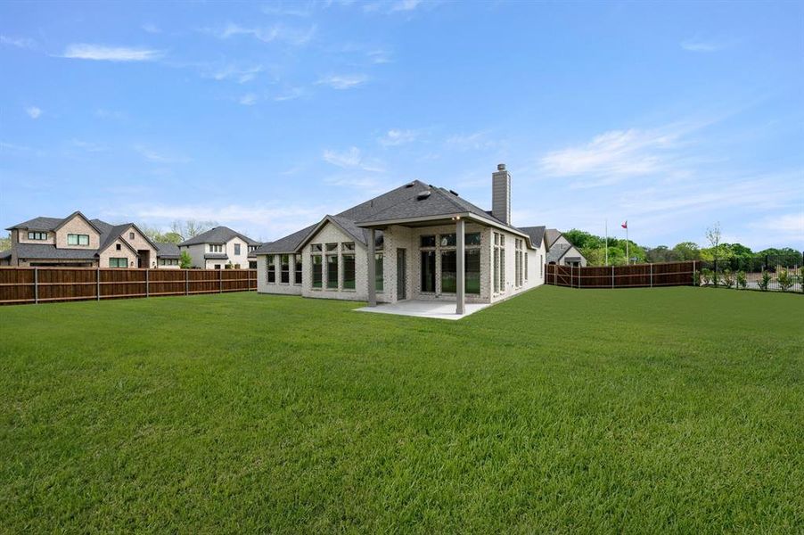 Exterior details and patio area of a home in Redden Farms - Phase 1, Midlothian (Image 25).