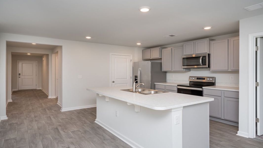 Representative furnished interior of a home built from the ARIA by D.R. Horton in The Meadows at Wildwood Village, Shallotte (Image 7). Representative furnished interior of a home built from the ARIA by D.R. Horton in The Meadows at Wildwood Village, Shallotte (Image 7).