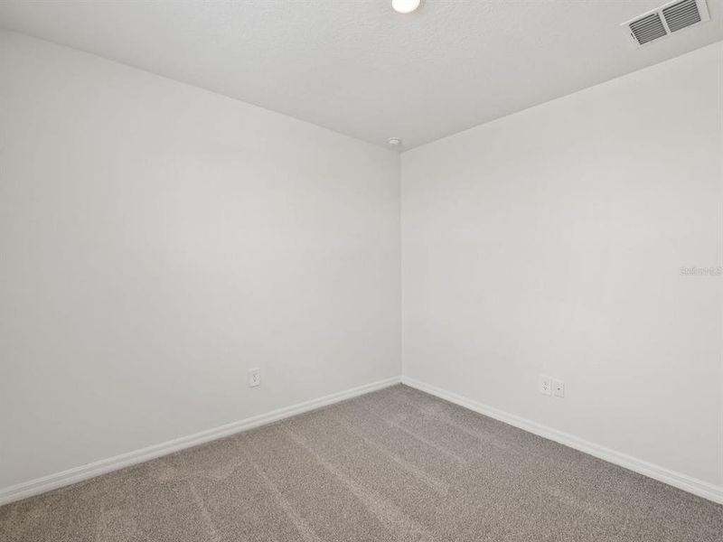 Spacious, unfurnished interior of a new home in The Reserve at Van Oaks, Auburndale (Image 17).