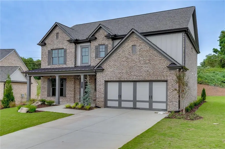Front exterior of a new home in , Buford, GA, highlighting curb appeal (Image 2). Front exterior of a new home in , Buford, GA, highlighting curb appeal (Image 2).
