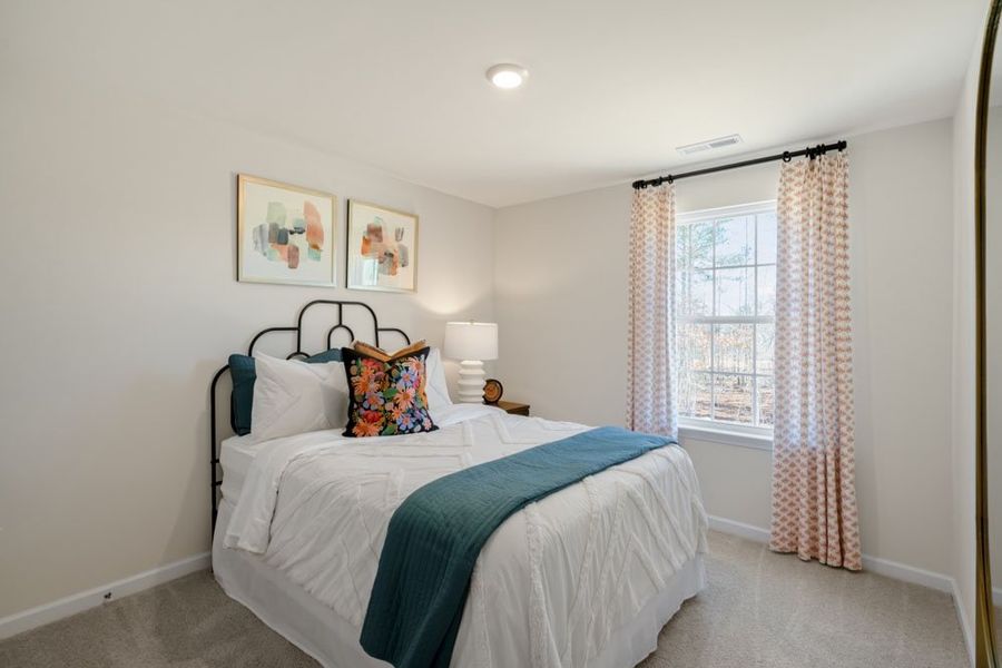 Representative furnished interior of a home built from the Belhaven by D.R. Horton in River's Edge, Mayodan (Image 28).