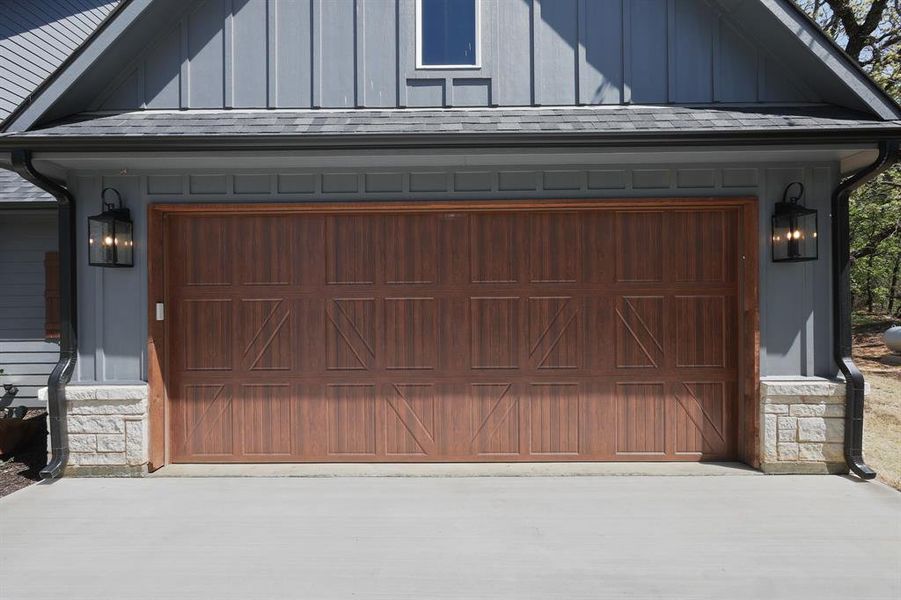 Garage with concrete driveway