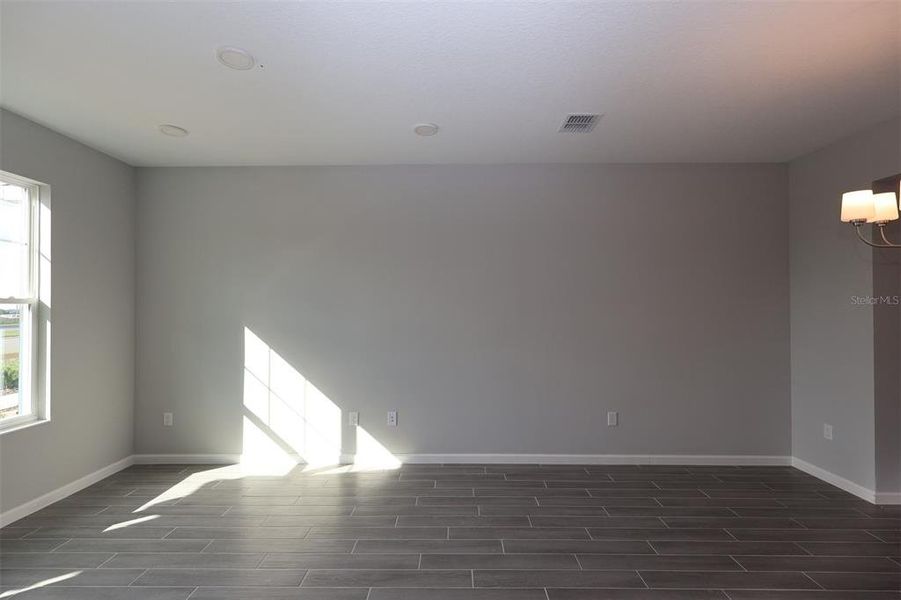 Spacious, unfurnished interior of a new home in Tribute at Ovation, Winter Garden (Image 32). Spacious, unfurnished interior of a new home in Tribute at Ovation, Winter Garden (Image 32).