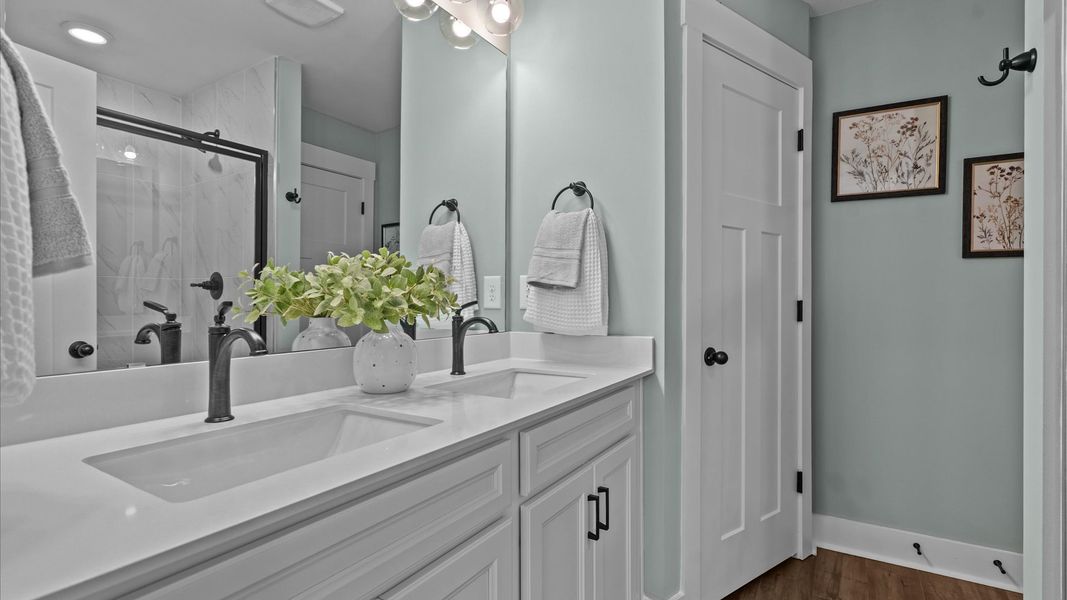 Representative furnished interior of a home built from the Corner Litchfield by DRB Homes in Gresham Station, Simpsonville (Image 23).