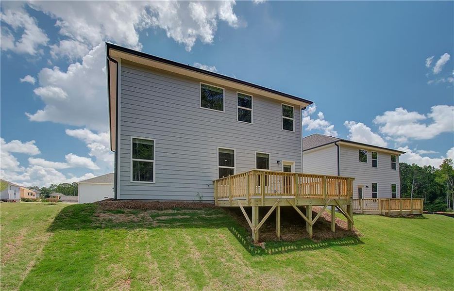 Front exterior of a new home in Enclave at Evergreen, Fairburn, GA, highlighting curb appeal (Image 13).