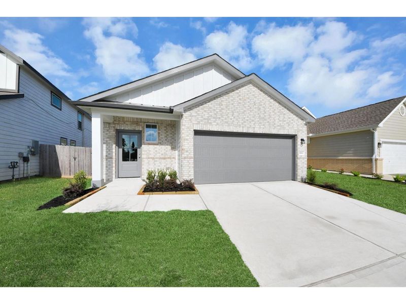 Front exterior of a new home in Robins Landing, Houston, TX, highlighting curb appeal (Image 1). Front exterior of a new home in Robins Landing, Houston, TX, highlighting curb appeal (Image 1).