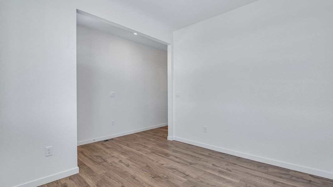 Spacious, unfurnished interior of a new home in Trails at Crowfoot, Parker (Image 20).