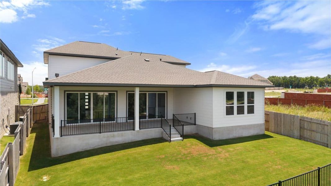 Exterior details and patio area of a home in Lariat, Liberty Hill (Image 28).