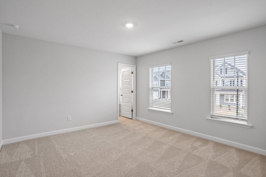 Spacious, unfurnished interior of a new home in Sweetbrier, Durham (Image 39).