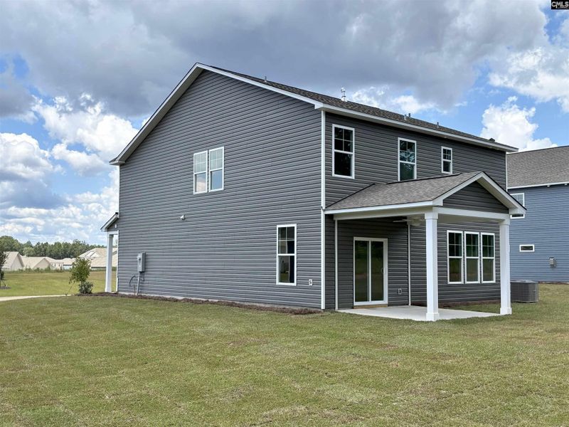 Front exterior of a new home in Rolling Hills, Prosperity, SC, highlighting curb appeal (Image 19).