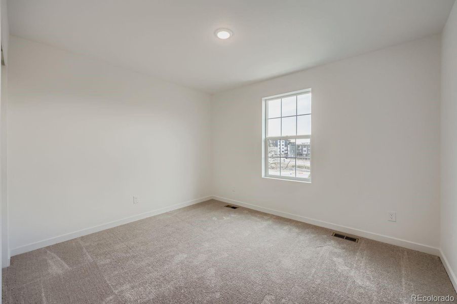 Spacious, unfurnished interior of a new home in Preserve at Mesa Creek: The Celestial Collection, Colorado Springs (Image 10).