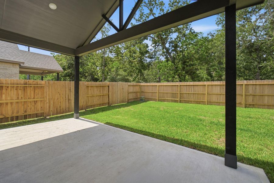 Exterior details and patio area of a home in Sundance Cove, Crosby (Image 4). Exterior details and patio area of a home in Sundance Cove, Crosby (Image 4).