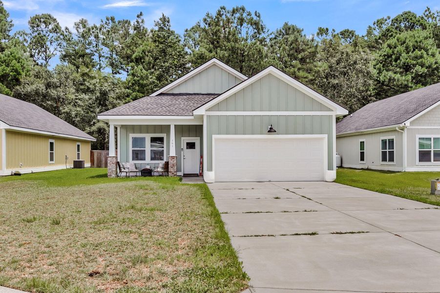Front exterior of a new home in , Huger, SC, highlighting curb appeal (Image 23). Front exterior of a new home in , Huger, SC, highlighting curb appeal (Image 23).