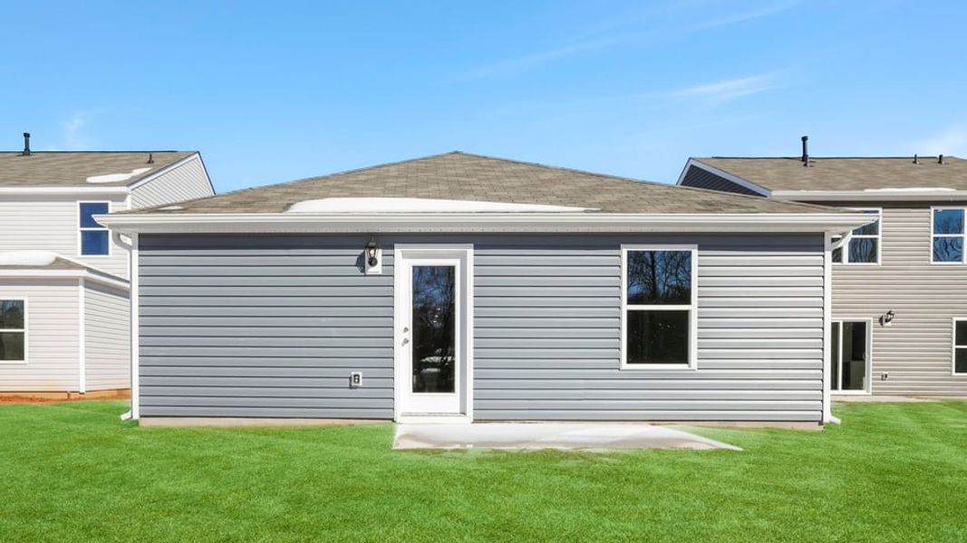 Exterior details and patio area of a home in Harper Ridge, Roebuck (Image 21).