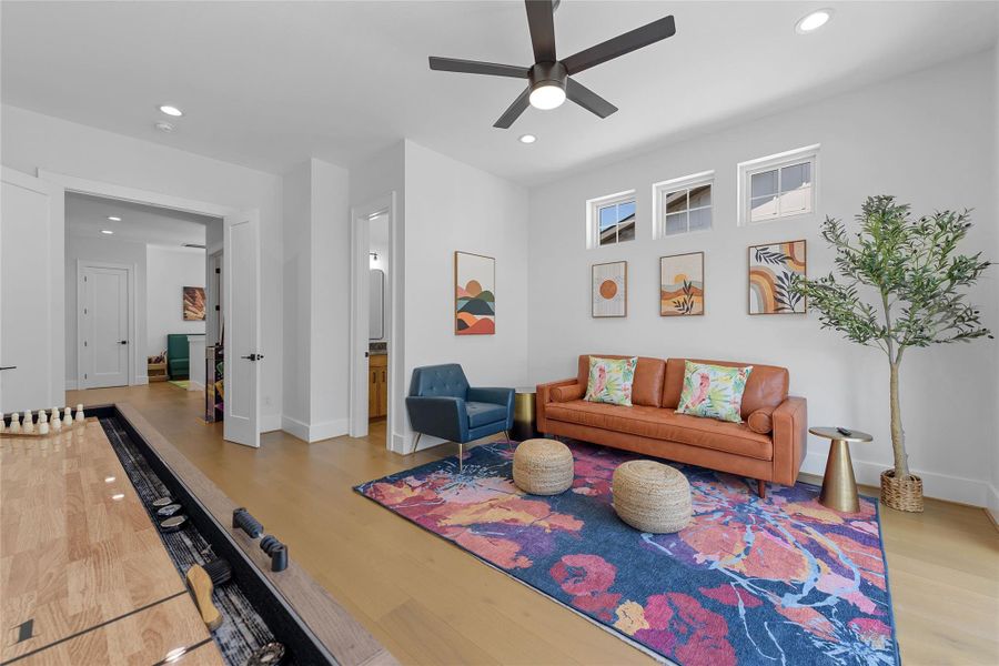 This flexible upstairs room with balcony access and sweeping Hill Country views is ideal as a guest room, game lounge, or media retreat. Enjoy natural light, modern finishes, and a relaxed vibe perfect for Canyon Lake living.