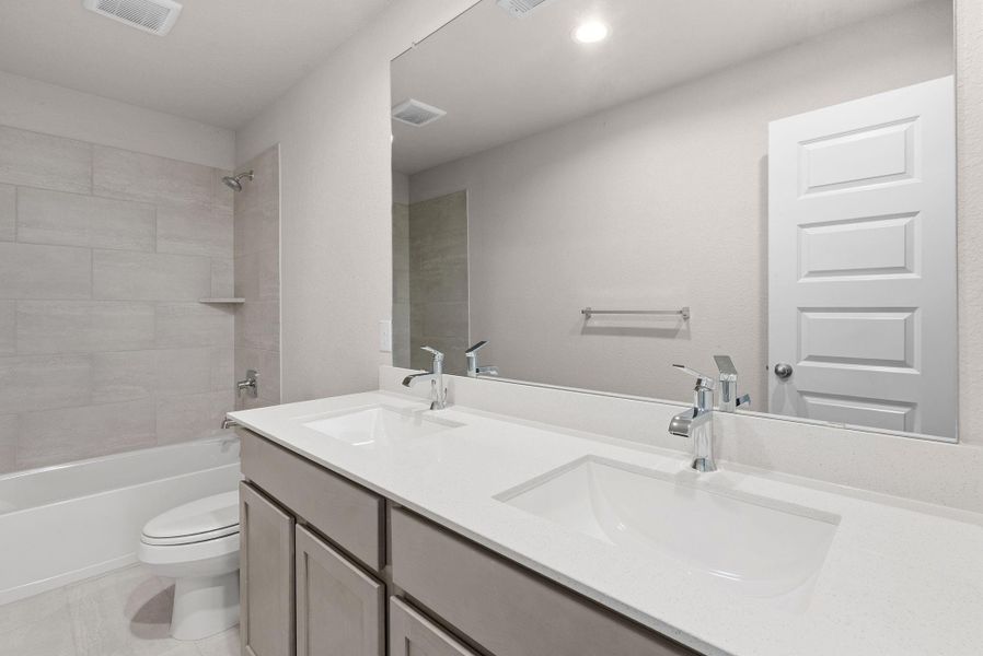 Furnished interior view inside a new home in Barton Creek Ranch, Conroe (Image 9). Furnished interior view inside a new home in Barton Creek Ranch, Conroe (Image 9).