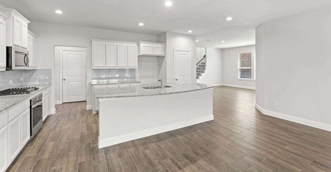 Representative exterior photo of a completed home built from the Goodrich by Impression Homes in Timberbrook, Justin, TX (Image 5).