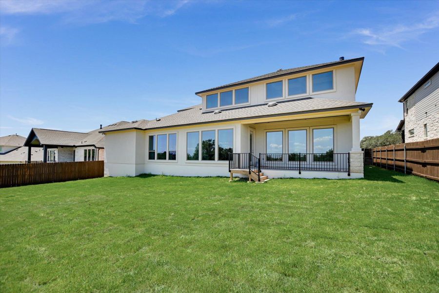 Front exterior of a new home in Riverstone, Georgetown, TX, highlighting curb appeal (Image 20). Front exterior of a new home in Riverstone, Georgetown, TX, highlighting curb appeal (Image 20).