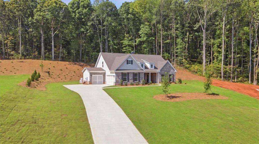 Front exterior of a new home in Bradley Gin, Monroe, GA, highlighting curb appeal (Image 31).