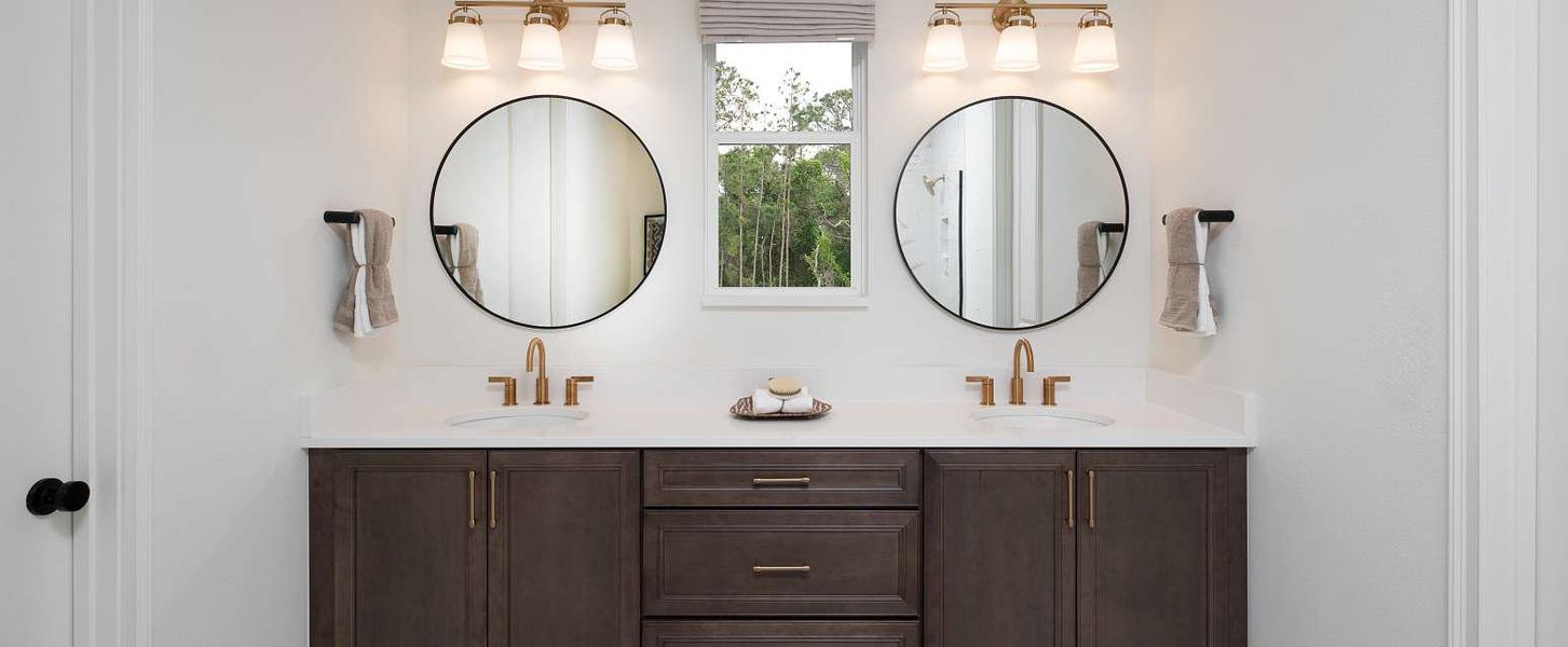 Furnished interior in a model home at Oakfield Trails Signature in Parrish (Image 21).