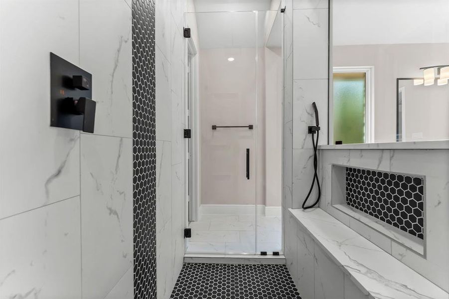 Large walk-in shower with double entry glass doors